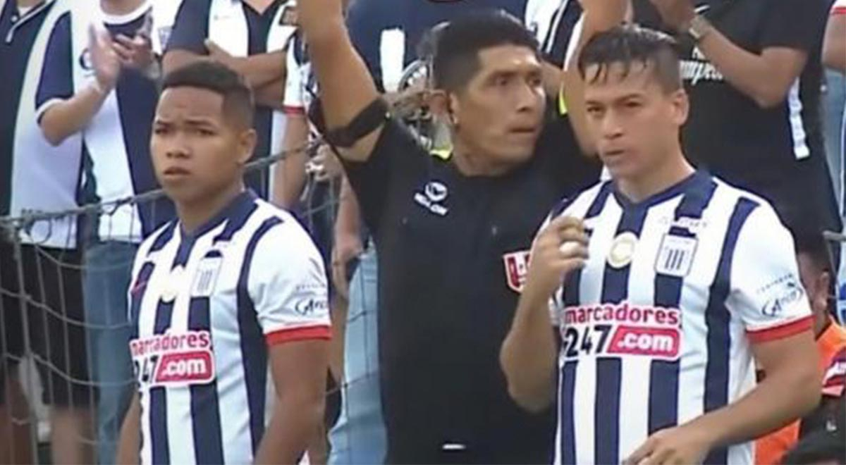 Cornejo al ingresar al campo con Benavente en Alianza vs. Mannucci